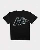 Camiseta oversize HeatCore Future Black negra con logo llama efecto cromado estampado en la espalda